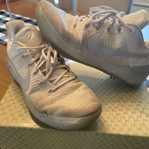 Nike men’s Kobe white sneakers